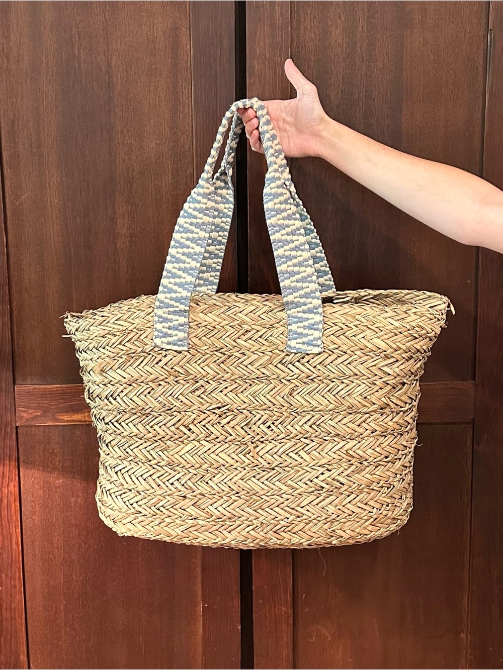 Woven tote bag • flexible, but sturdy • thick, cloth handles